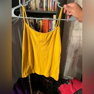 Forever 21 yellow tank goes right to the top of standard belt line